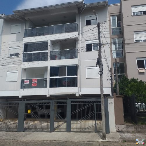 Direitos e ações sobre o box nº 05 do residencial caroline perin ii, com área real privativa de 19,67m², em caxias do sul/rs