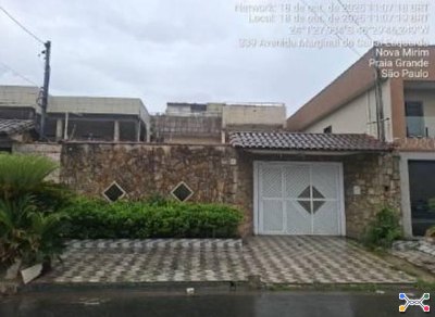 Casa 503m² com Terreno 300m² | Praia Grande-SP | Nova Mirim - 5 Dormitórios, 7 Banheiros e Piscina - Financiamento até 420 Meses!